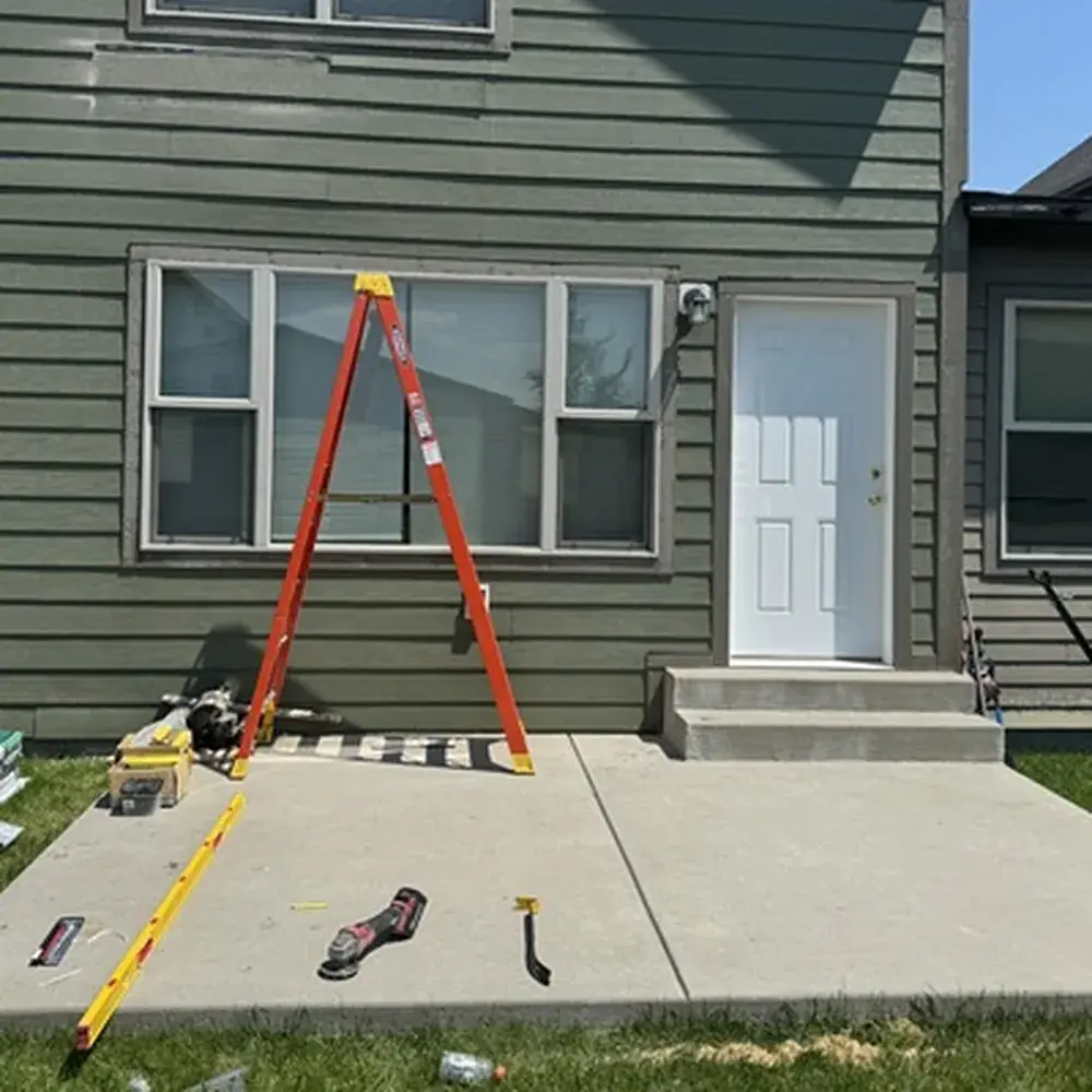 Technician performing maintenance contracting tasks inside a Bozeman - MT property while inspecting trim and hardware